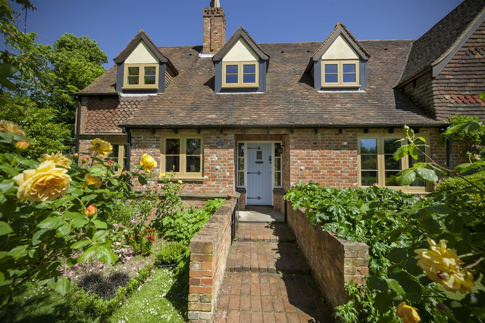 Residence 9 heritage style flush windows on a traditional cottage
